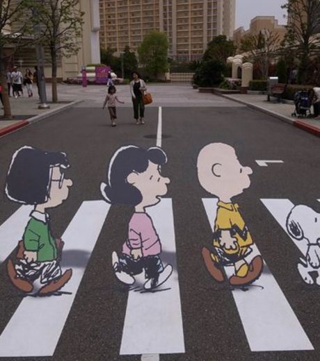 An illusion Of Kids crossing a road.
