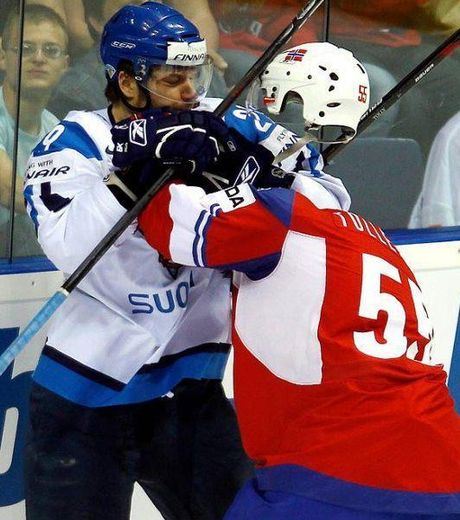 This ice hockey player is not fighting against the invisible man.