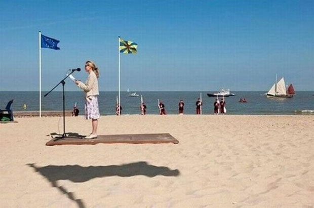 This woman is not riding a flying carpet