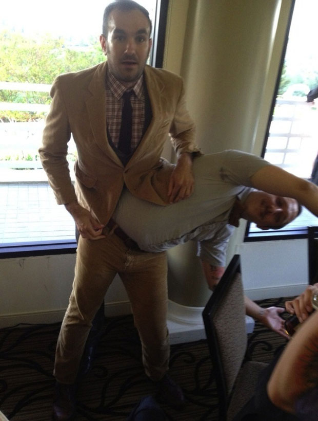 The two men do not have same legs