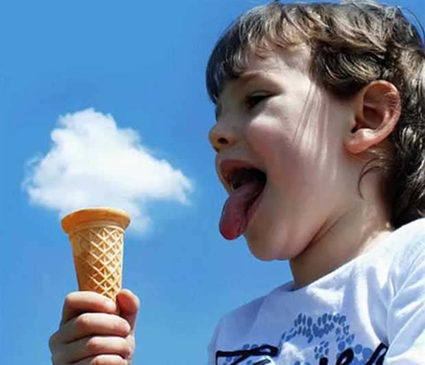 Cloud appearing as ice-cream over a boy cone.