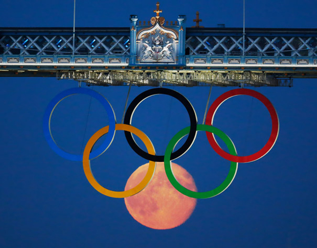 Moon among Olympic circles.