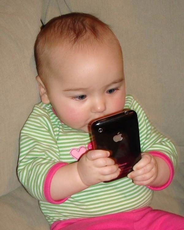 A baby born with knowledge of technology