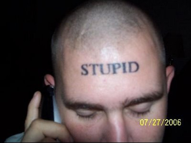 Tattoo of word stupid