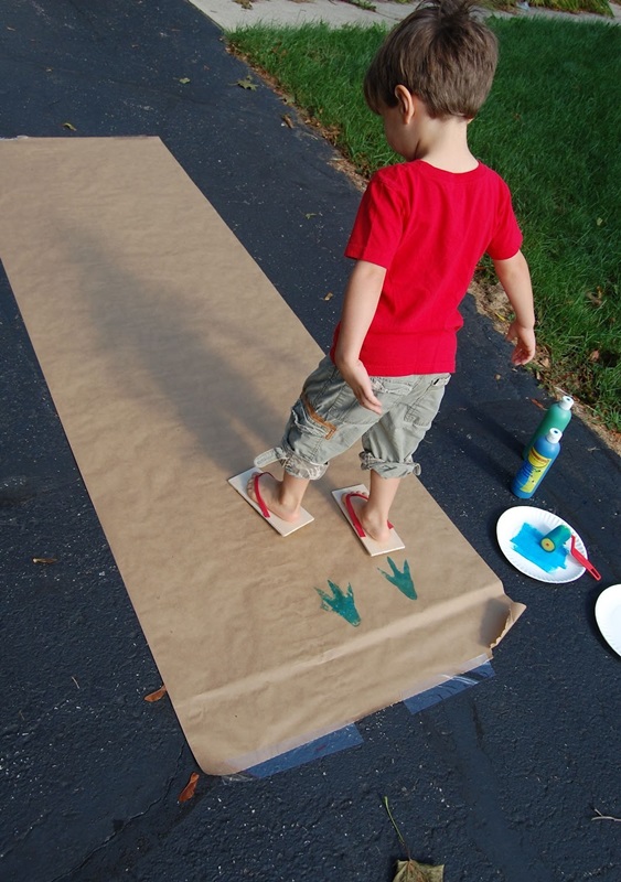 Make dinosaur footprints with flip flops