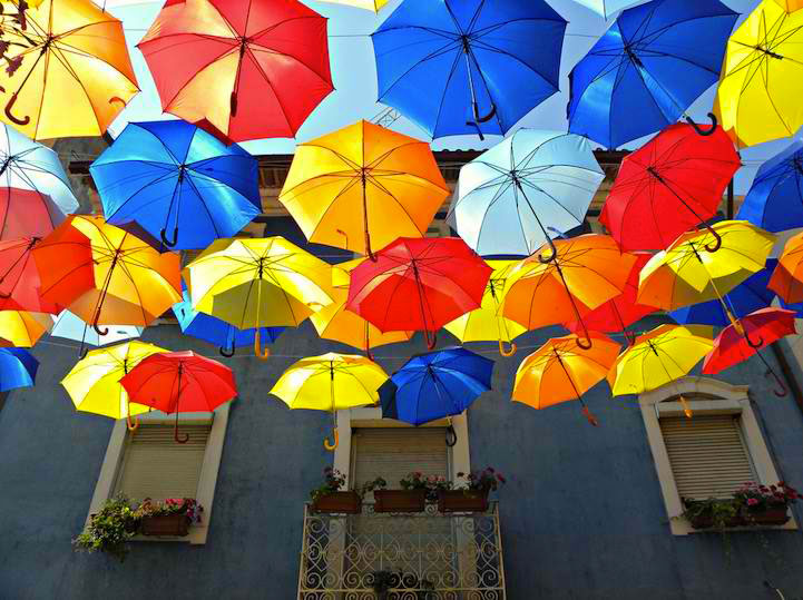 Levitation (Hanging) Of Hundreds Of Colorful Umbrellas In Agueda, Portugal