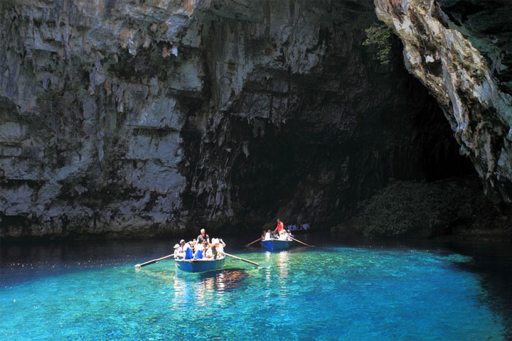 In a boat inside a cave in Kefalonia, Greece