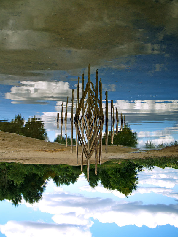 Symmetrical artworks of French artist Ludovic Fesson using nature, light and water reflections