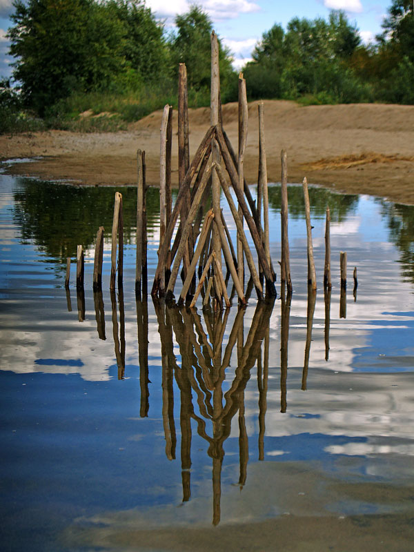 Symmetrical artworks of French artist Ludovic Fesson using nature, light and water reflections