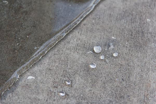 Hydrophobic Liquids Used To Create Artworks Only Visible In Rain 