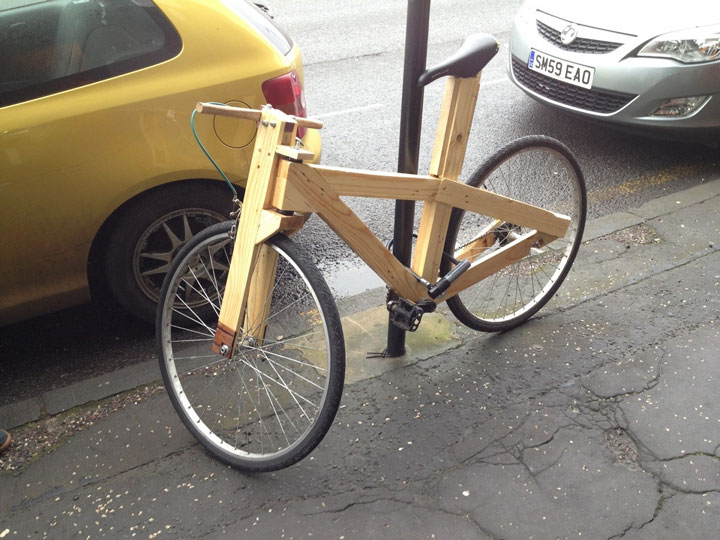 The person uses a bicycle made from wooden boards-25 extreme Hipsters of modern times-14