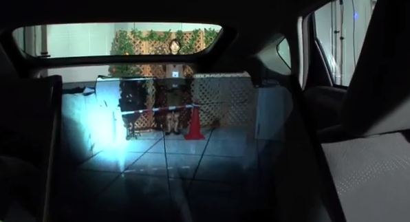 An Optical Camouflage That Removes The Back-Seat Of A Car