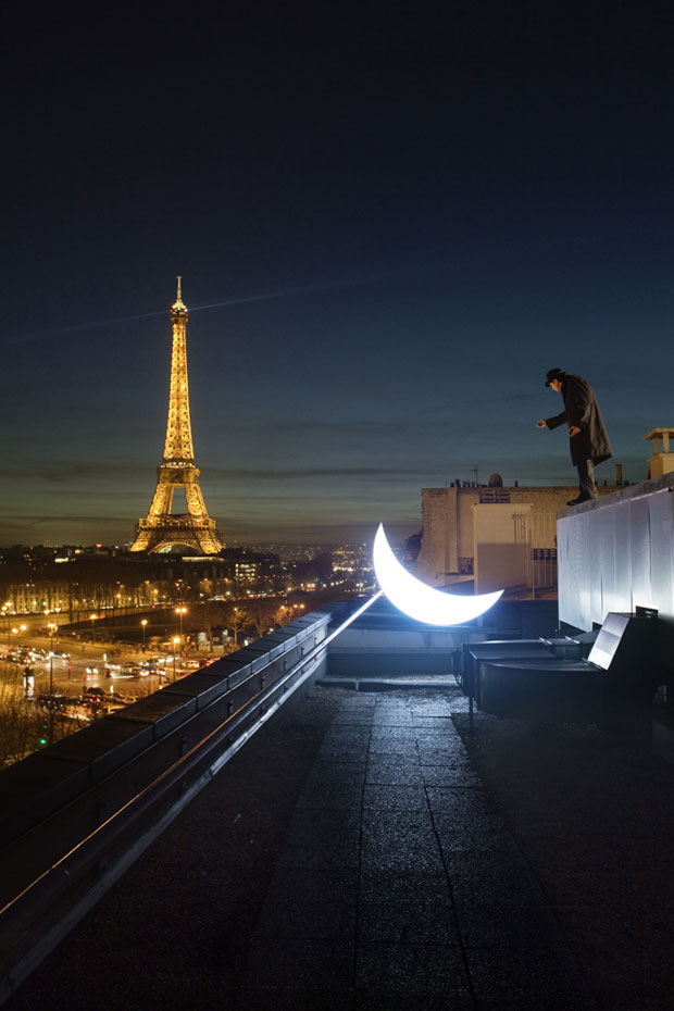 Surrealist Photos Of Russian Artist Posing With A Portable Moon Around The World (Gallery)