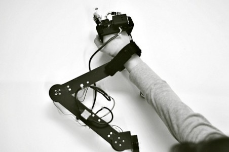 This Revolutionary Robotic Glove Teaches Anyone To Draw -1