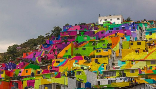 To Unite The Community Against Violence Artists Paint A Mural On 200 Houses -13