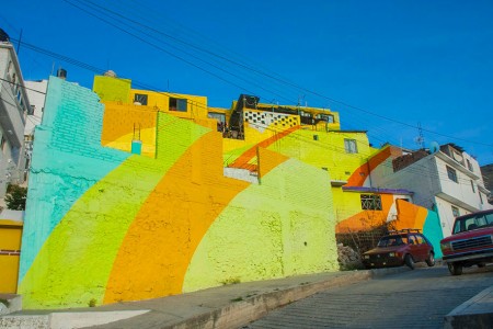 To Unite The Community Against Violence Artists Paint A Mural On 200 Houses -2