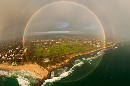 A rainbow photographed from an airplane